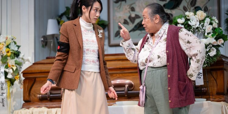 ‘Liars at a Funeral’ turns grief into gleeful comedy.